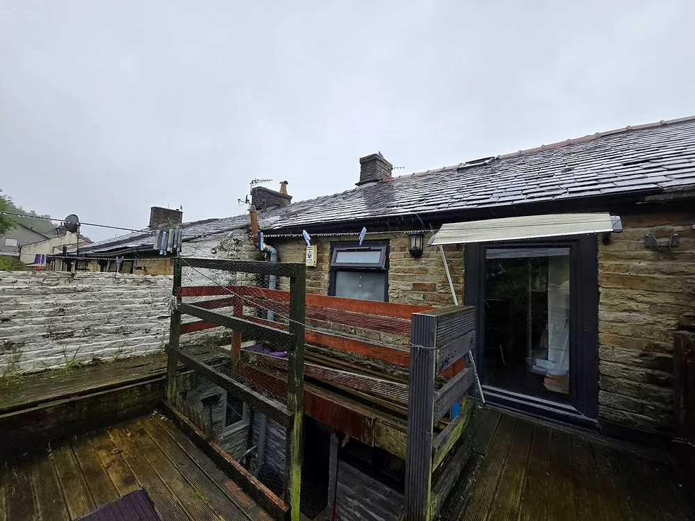 The old timber deck and fencing before the work
