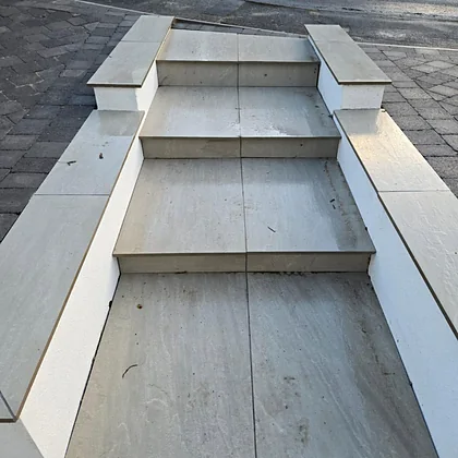 Pale porcelain steps with matching side walls